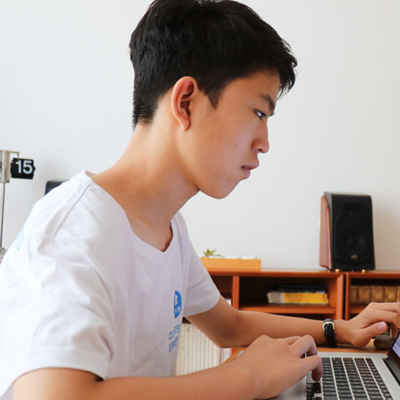 A child, of Grade 8 and Age 13, learning iClever Code online courses
